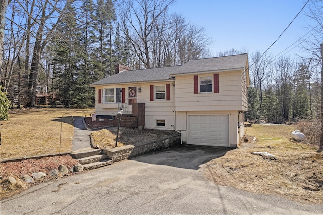 369 Windham Center Rd, Windham, ME 04062 - view of front of home with a chimney, driveway, roof with shingles, and an attached garage