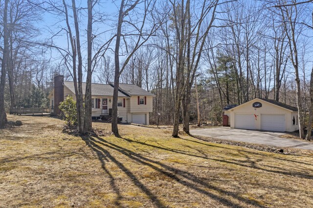 369 Windham Center Rd, Windham, ME 04062 - view of front of property with driveway, a chimney, and a front lawn