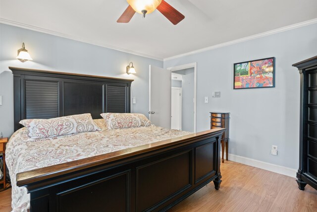 369 Windham Center Rd, Windham, ME 04062 - bedroom featuring baseboards, light wood-type flooring, and crown molding