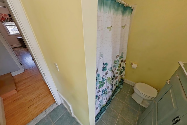 369 Windham Center Rd, Windham, ME 04062 - bathroom featuring baseboards, toilet, a shower with shower curtain, and baseboard heating
