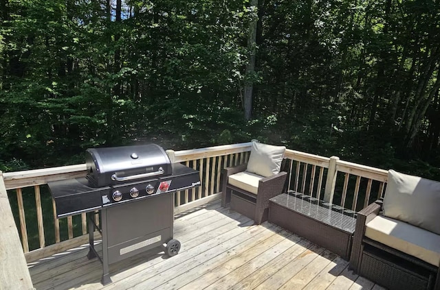 deck featuring a grill