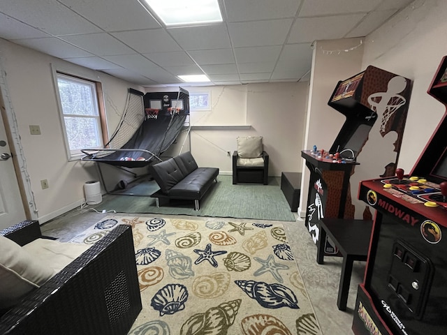 sitting room featuring a drop ceiling