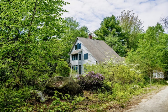 67 Rob Rd, Brooklin, ME 04616 - view of home's exterior with a chimney