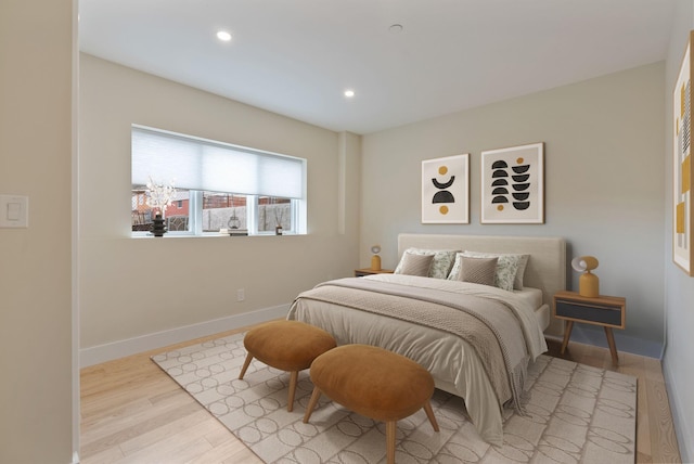 34 Hammond St Unit B, Portland, ME 04101 - bedroom with recessed lighting, baseboards, and wood finished floors
