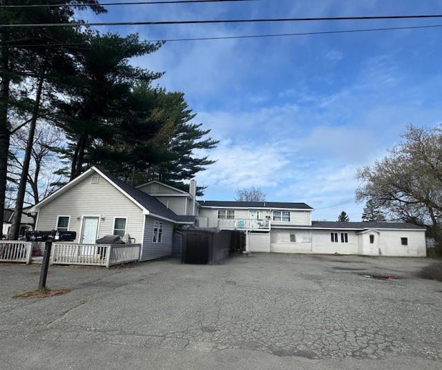 58 Greenwood Ave, Skowhegan, ME 04976 - view of front of home with a deck and a chimney
