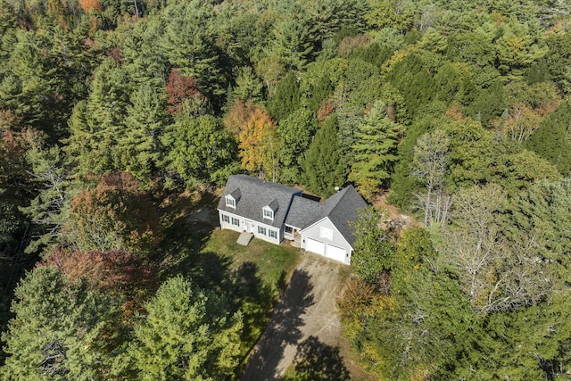 drone / aerial view with a view of trees