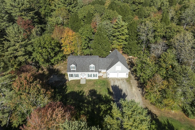 bird's eye view featuring a forest view
