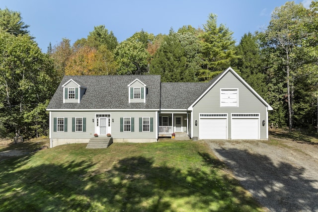 cape cod-style house featuring a garage, gravel driveway, a shingled roof, and a front yard