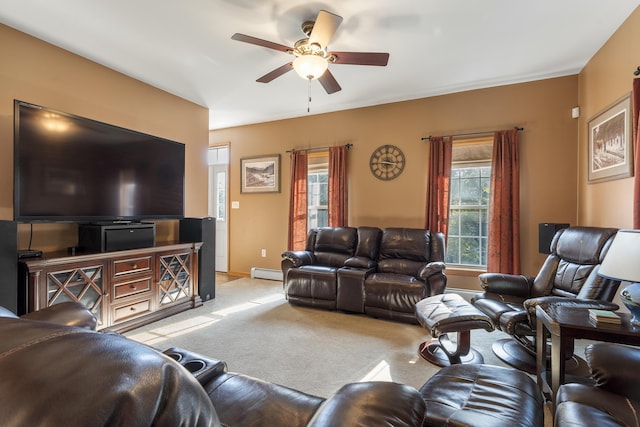 living room with a baseboard radiator, a ceiling fan, light colored carpet, and baseboards