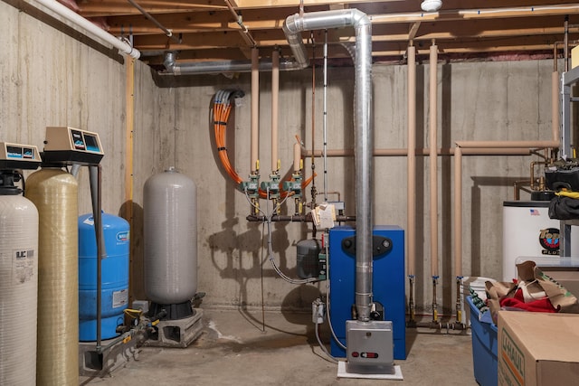 utilities featuring water heater and a heating unit