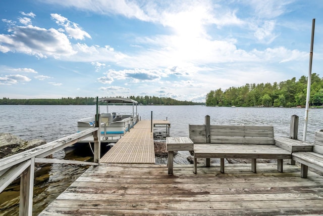 32 Seymour Cove Rd, Bowerbank, ME 04426 - dock featuring a water view and boat lift