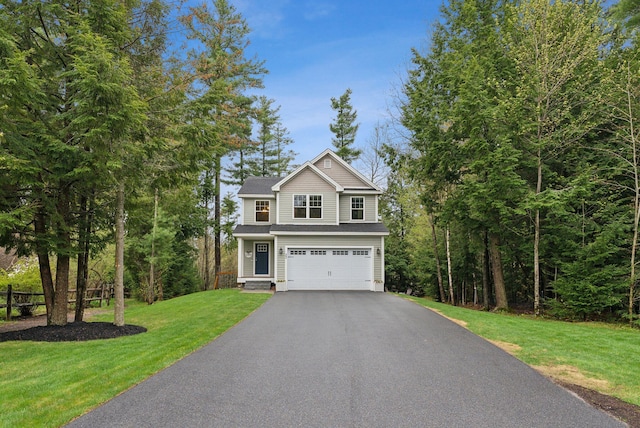 33 Old Dynamite Way, Gorham, ME 04038 - traditional-style house with an attached garage, asphalt driveway, and a front yard