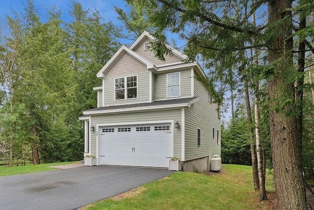 33 Old Dynamite Way, Gorham, ME 04038 - view of property exterior featuring driveway, a garage, and a yard