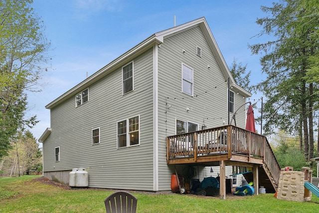 33 Old Dynamite Way, Gorham, ME 04038 - rear view of house featuring a wooden deck, stairs, and a lawn