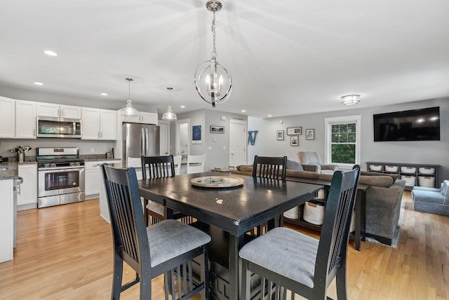 33 Old Dynamite Way, Gorham, ME 04038 - dining room with recessed lighting, light wood finished floors, and a chandelier