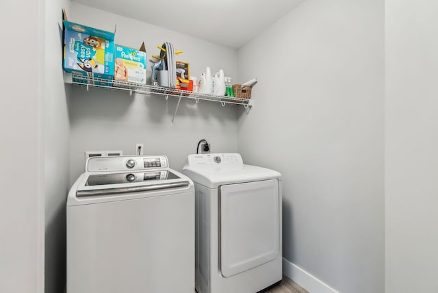33 Old Dynamite Way, Gorham, ME 04038 - laundry room with washing machine and dryer, baseboards, and wood finished floors