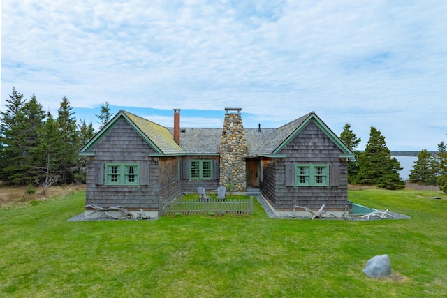 421 Petitmanan Point Rd, Steuben, ME 04680 - shingle-style home featuring a chimney and a front yard