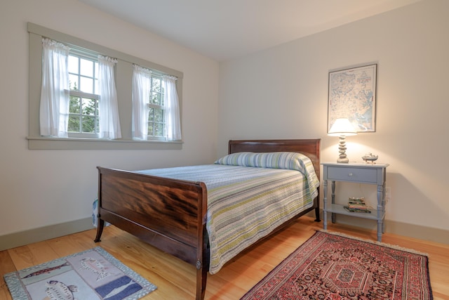 421 Petitmanan Point Rd, Steuben, ME 04680 - bedroom featuring light wood-style floors and baseboards