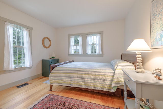421 Petitmanan Point Rd, Steuben, ME 04680 - bedroom featuring wood finished floors
