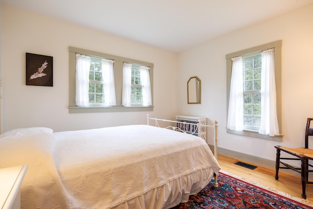 421 Petitmanan Point Rd, Steuben, ME 04680 - bedroom featuring wood finished floors and baseboards