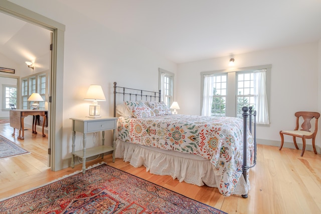 421 Petitmanan Point Rd, Steuben, ME 04680 - bedroom featuring wood finished floors and baseboards