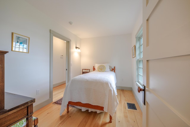 421 Petitmanan Point Rd, Steuben, ME 04680 - bedroom featuring light wood-style flooring and baseboards