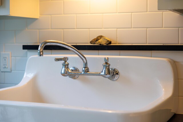 421 Petitmanan Point Rd, Steuben, ME 04680 - detailed view of a sink and tasteful backsplash