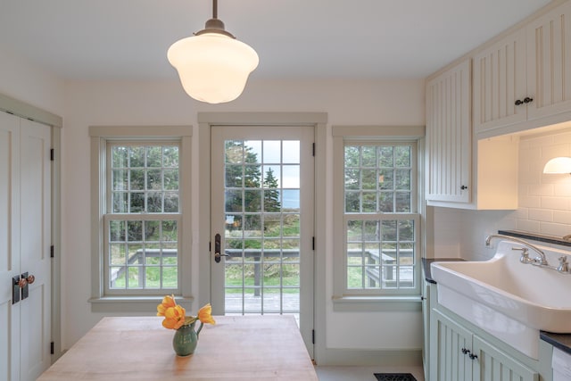 421 Petitmanan Point Rd, Steuben, ME 04680 - dining room with baseboards