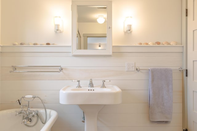 421 Petitmanan Point Rd, Steuben, ME 04680 - bathroom featuring a freestanding bath