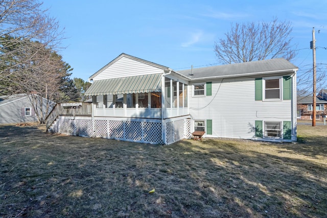 58 Bayview Ter, Wells, ME 04090 - rear view of property with a lawn and a sunroom