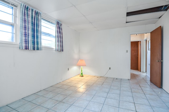 58 Bayview Ter, Wells, ME 04090 - spare room with a paneled ceiling and light tile patterned floors