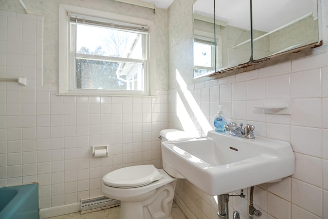 58 Bayview Ter, Wells, ME 04090 - full bath with toilet, a sink, baseboard heating, a bath, and tile walls