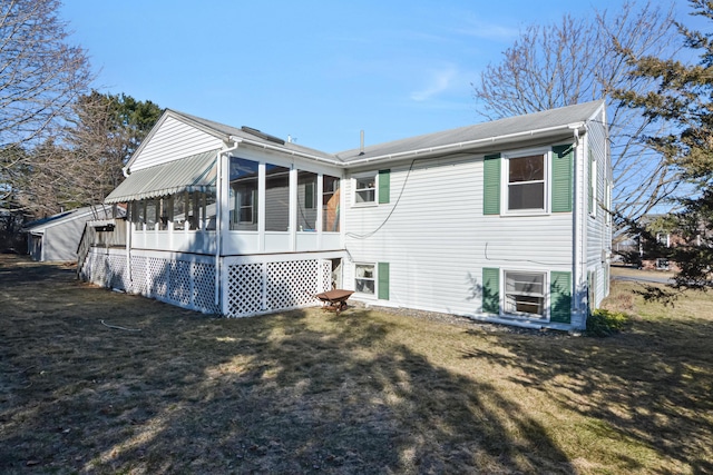 58 Bayview Ter, Wells, ME 04090 - back of house with a lawn and a sunroom