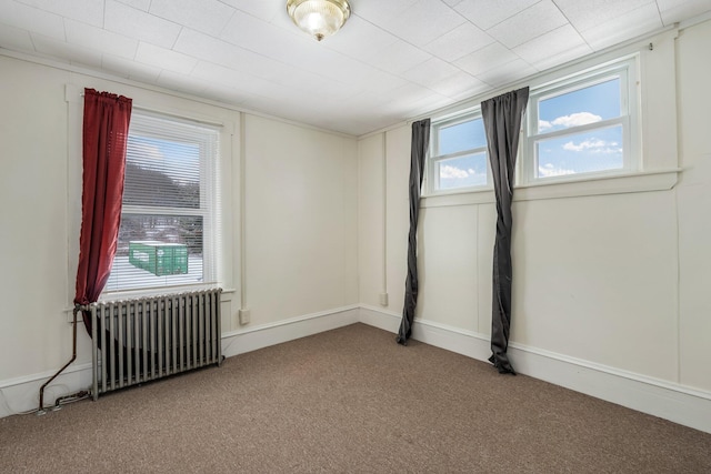 57 Oxford St, Augusta, ME 04330 - carpeted spare room featuring radiator