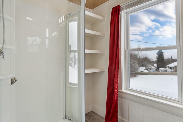 57 Oxford St, Augusta, ME 04330 - interior space with a shower stall, a wealth of natural light, and wood finished floors
