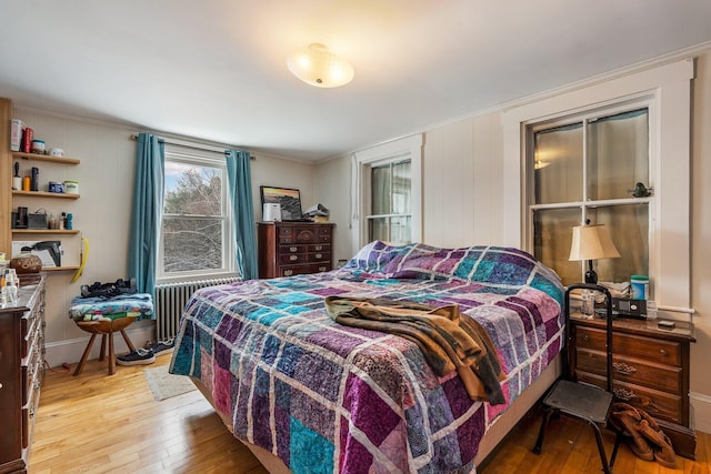 57 Oxford St, Augusta, ME 04330 - bedroom featuring radiator heating unit, baseboards, and light wood finished floors