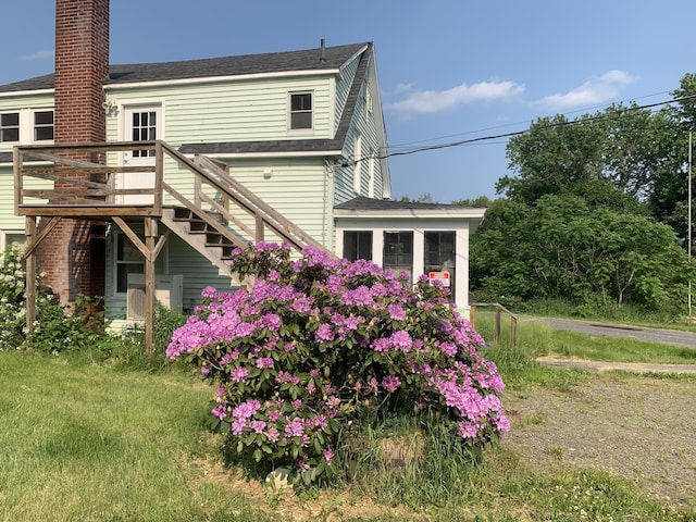 57 Oxford St, Augusta, ME 04330 - rear view of property featuring a wooden deck, a chimney, and stairs