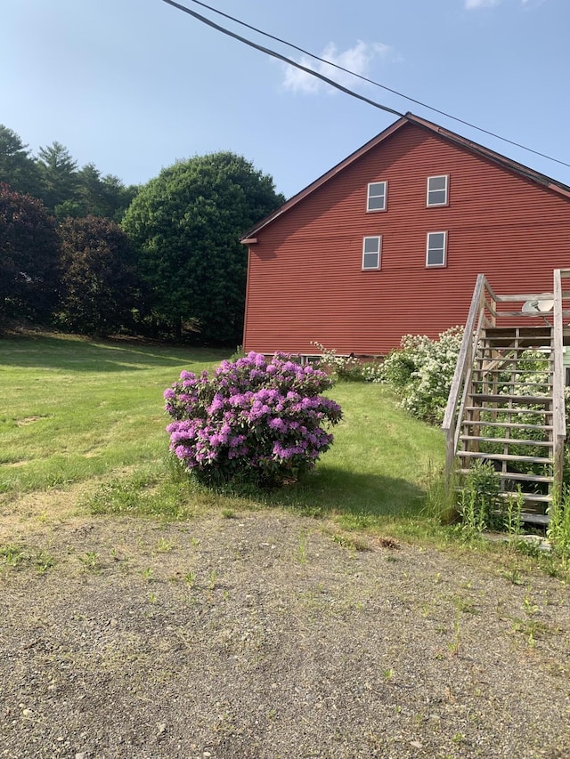 57 Oxford St, Augusta, ME 04330 - view of home's exterior featuring stairway and a lawn