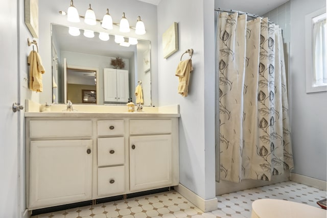 97 Gleason St, Thomaston, ME 04861 - full bath featuring baseboards, toilet, tile patterned floors, and vanity