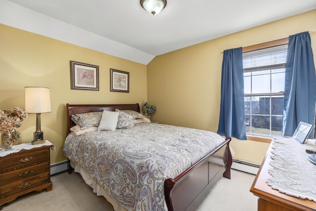 97 Gleason St, Thomaston, ME 04861 - bedroom featuring lofted ceiling, a baseboard heating unit, and light carpet
