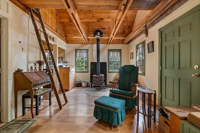 LOT6-1 Sand Shed Loop, Amherst, ME 04605 - sitting room with a wood stove, wood ceiling, beamed ceiling, and wood finished floors