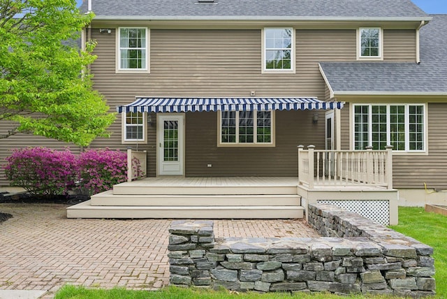 31 Green Trees Dr, Gorham, ME 04038 - rear view of property featuring a patio, a deck, and a shingled roof