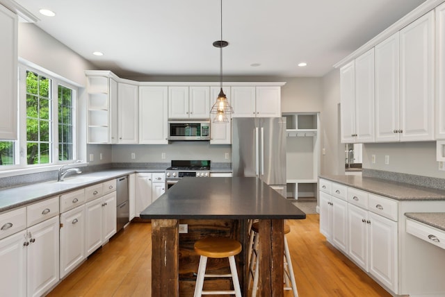 31 Green Trees Dr, Gorham, ME 04038 - kitchen featuring stainless steel appliances, a sink, white cabinets, and recessed lighting