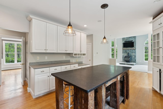 31 Green Trees Dr, Gorham, ME 04038 - kitchen with light wood-type flooring, plenty of natural light, white cabinets, and recessed lighting