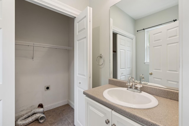 31 Green Trees Dr, Gorham, ME 04038 - bathroom with vanity, a closet, tile patterned flooring, and baseboards