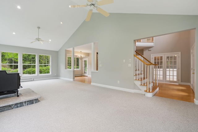 31 Green Trees Dr, Gorham, ME 04038 - carpeted living room featuring high vaulted ceiling, a ceiling fan, baseboards, a chandelier, and stairs