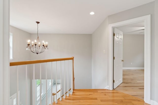 31 Green Trees Dr, Gorham, ME 04038 - corridor with wood finished floors, a chandelier, recessed lighting, and baseboards