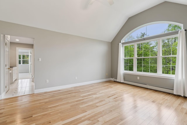 31 Green Trees Dr, Gorham, ME 04038 - empty room featuring a baseboard radiator, light wood-style flooring, vaulted ceiling, a ceiling fan, and baseboards