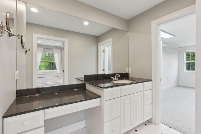 31 Green Trees Dr, Gorham, ME 04038 - full bath with healthy amount of natural light, vanity, recessed lighting, baseboards, and tile patterned flooring
