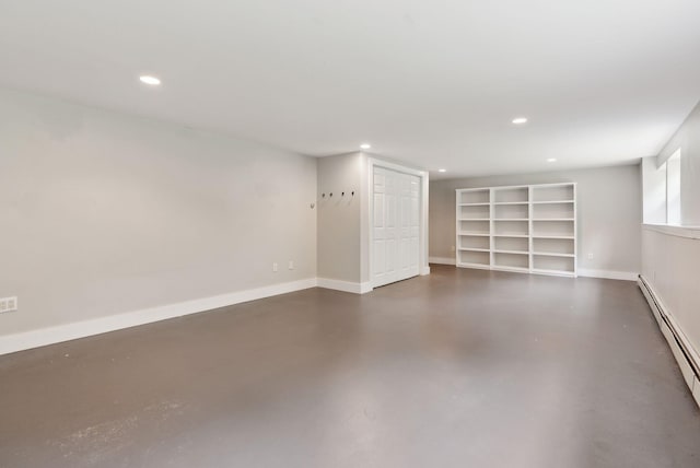 31 Green Trees Dr, Gorham, ME 04038 - basement featuring a baseboard radiator, baseboards, and recessed lighting